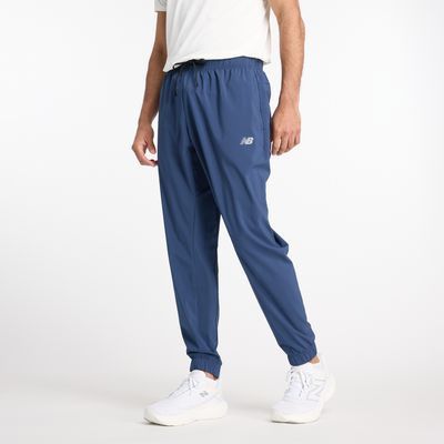 Spodnie męskie jesienne w sportowym stylu New Balance ze sklepu: New Balance Poland w kategorii: Spodnie męskie - zdjęcie 08F3FC-30B-10813_3215329