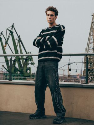 Jeansy męskie młodzieżowe ze sklepu: Cropp w kategorii: Jeansy męskie - zdjęcie 4198BBB-532-6969_739HX-99J