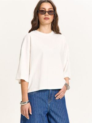 Bluzka damska ze sklepu: Cropp w kategorii: Bluzki damskie - zdjęcie 4198BBB-532-6969_808FL-01X