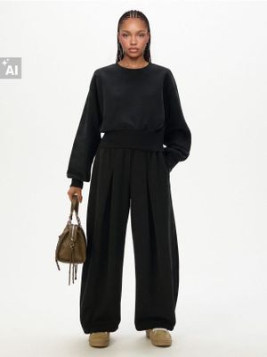 Spodnie damskie retro ze sklepu: Cropp w kategorii: Spodnie damskie