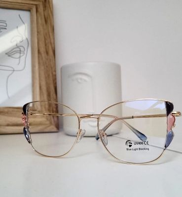 Okulary korekcyjne damskie ze sklepu: Stylion w kategorii: Okulary korekcyjne damskie - zdjęcie 4D4DD33-06F-2088_7906