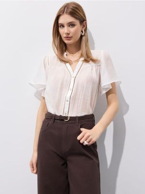 Bluzka damska Mohito ze sklepu: Mohito w kategorii: Bluzki damskie - zdjęcie 55A556F-010-6967_050GV