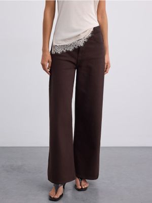 Jeansy damskie Mohito ze sklepu: Mohito w kategorii: Jeansy damskie - zdjęcie 55A556F-010-6967_084KG
