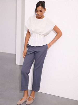 Spodnie damskie casual Mohito ze sklepu: Mohito w kategorii: Spodnie damskie - zdjęcie 55A556F-010-6967_089LT