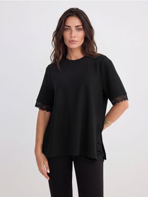 Bluzka damska Mohito ze sklepu: Mohito w kategorii: Bluzki damskie - zdjęcie 55A556F-010-6967_0971U