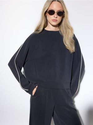 Bluza damska jesienna Mohito ze sklepu: Mohito w kategorii: Bluzy damskie - zdjęcie 55A556F-010-6967_269HF