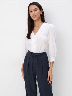 Bluzka damska casual Mohito ze sklepu: Mohito w kategorii: Bluzki damskie - zdjęcie 55A556F-010-6967_292CF