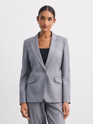 Marynarka Mohito ze sklepu: Mohito w kategorii: Marynarki damskie - zdjęcie 55A556F-010-6967_349KU