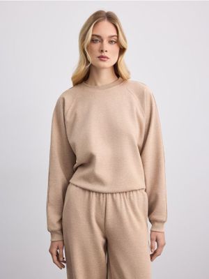 Bluza damska Mohito ze sklepu: Mohito w kategorii: Bluzy damskie - zdjęcie 55A556F-010-6967_379KT