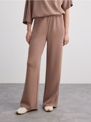 Spodnie damskie casual jesienne Mohito ze sklepu: Mohito w kategorii: Spodnie damskie - zdjęcie 55A556F-010-6967_473KT