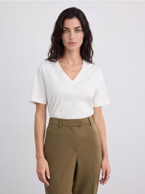 Bluzka damska Mohito ze sklepu: Mohito w kategorii: Bluzki damskie - zdjęcie 55A556F-010-6967_573JE