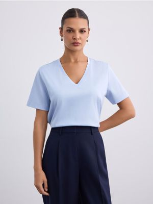 Bluzka damska Mohito ze sklepu: Mohito w kategorii: Bluzki damskie - zdjęcie 55A556F-010-6967_573JE