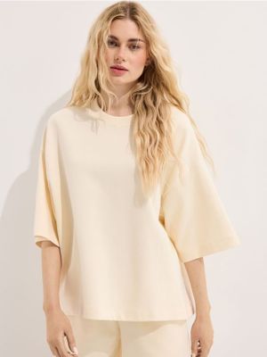 Bluzka damska casual Mohito ze sklepu: Mohito w kategorii: Bluzki damskie - zdjęcie 55A556F-010-6967_582JE