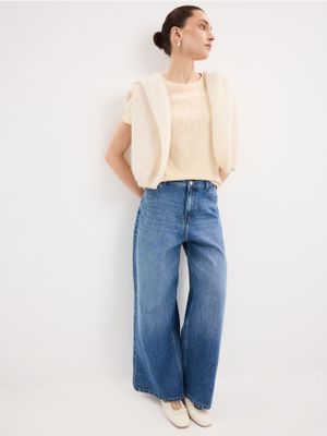 Jeansy damskie Mohito ze sklepu: Mohito w kategorii: Jeansy damskie - zdjęcie 55A556F-010-6967_648IH