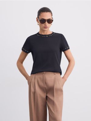Bluzka damska casual Mohito ze sklepu: Mohito w kategorii: Bluzki damskie - zdjęcie 55A556F-010-6967_703JR