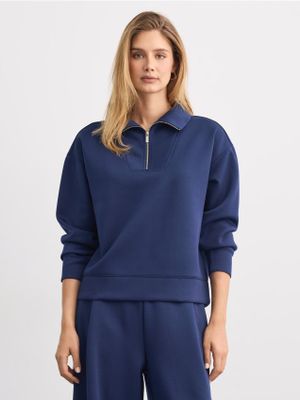 Bluza damska casual Mohito ze sklepu: Mohito w kategorii: Bluzy damskie - zdjęcie 55A556F-010-6967_718LA