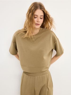 Mohito - Bluzka damska wiosenna casualowa ze sklepu: Mohito w kategorii: Bluzki damskie - zdjęcie 55A556F-010-6967_731JE