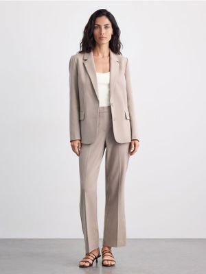 Spodnie damskie eleganckie Mohito ze sklepu: Mohito w kategorii: Spodnie damskie - zdjęcie 55A556F-010-6967_734JJ