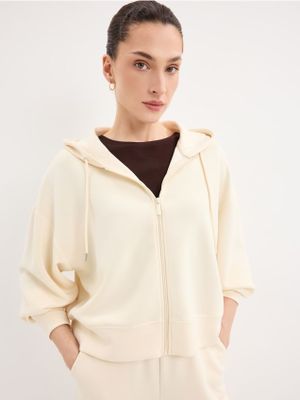 Bluza damska casual Mohito ze sklepu: Mohito w kategorii: Bluzy damskie - zdjęcie 55A556F-010-6967_769JE