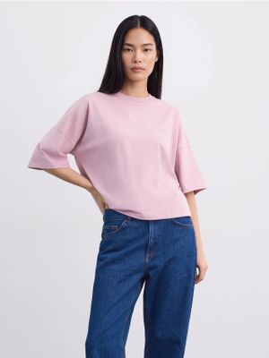 Bluzka damska casual Mohito ze sklepu: Mohito w kategorii: Bluzki damskie - zdjęcie 55A556F-010-6967_831JT