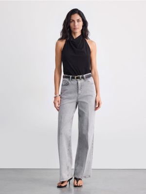 Mohito - Jeansy damskie na wiosnę ze sklepu: Mohito w kategorii: Jeansy damskie - zdjęcie 55A556F-010-6967_866MD
