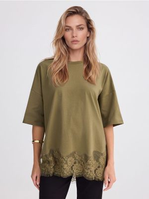 Bluzka damska Mohito ze sklepu: Mohito w kategorii: Bluzki damskie - zdjęcie 55A556F-010-6967_979LD