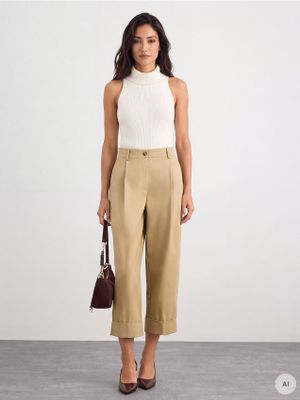 Spodnie damskie retro Mohito ze sklepu: Mohito w kategorii: Spodnie damskie - zdjęcie 55A556F-010-6967_981LU
