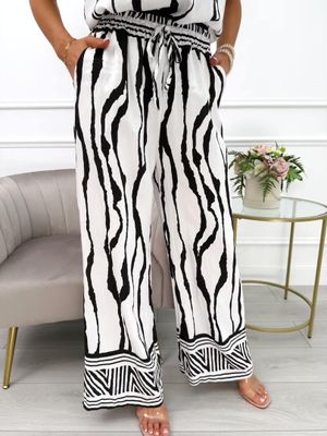 Spodnie damskie casual ModnaKiecka.pl ze sklepu: ModnaKiecka.pl w kategorii: Spodnie damskie - zdjęcie 64ECE52-355-6290_23069059