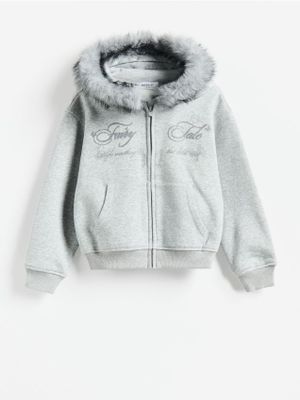 Bluza dziewczęca na wiosnę Reserved ze sklepu: Reserved w kategorii: Bluzy dziewczęce