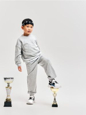 Spodnie męskie na jesień w sportowym stylu Reserved ze sklepu: Reserved w kategorii: Spodnie męskie - zdjęcie 74CCA4C-3C1-6972_275JX