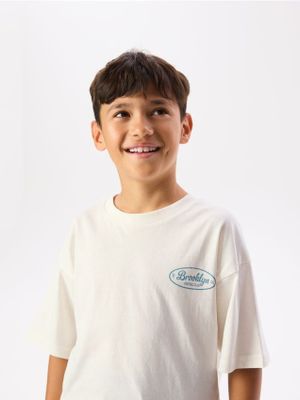T-shirt chłopięce na lato Reserved ze sklepu: Reserved w kategorii: T-shirty chłopięce - zdjęcie 74CCA4C-3C1-6972_290JV
