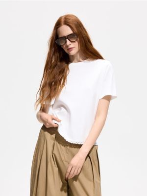 Bluzka damska casual Reserved ze sklepu: Reserved w kategorii: Bluzki damskie - zdjęcie 74CCA4C-3C1-6972_509KL