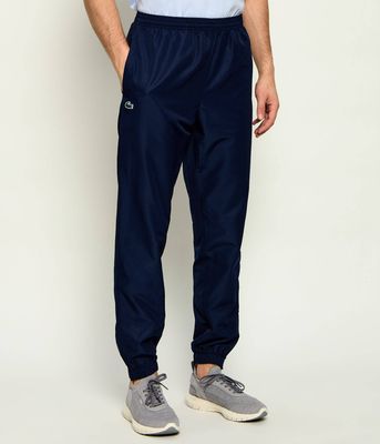 Spodnie męskie jesienne w sportowym stylu Lacoste ze sklepu: Gomez Fashion Store w kategorii: Spodnie męskie - zdjęcie 874714-BD9-10338_LA232M000085166