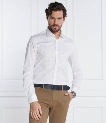 Koszula męska z klasycznym kołnierzykiem Calvin Klein ze sklepu: Gomez Fashion Store w kategorii: Koszule męskie - zdjęcie 874714-BD9-10338_CK235M000124217