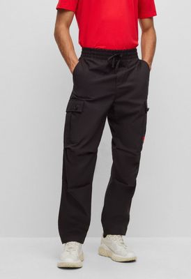 HUGO - Spodnie męskie na jesień casual ze sklepu: Gomez Fashion Store w kategorii: Spodnie męskie - zdjęcie 874714-BD9-10338_BU241M000175001