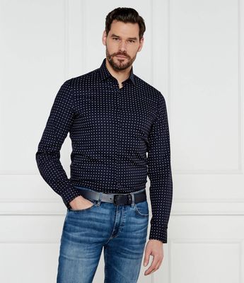 Koszula męska z klasycznym kołnierzykiem Calvin Klein ze sklepu: Gomez Fashion Store w kategorii: Koszule męskie - zdjęcie 874714-BD9-10338_CK251M000068B31
