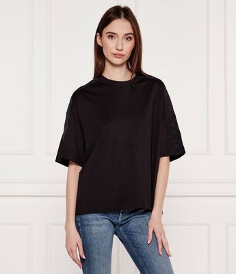 Bluzka damska Armani Exchange ze sklepu: Gomez Fashion Store w kategorii: Bluzki damskie - zdjęcie 874714-BD9-10338_AX252W000087H50