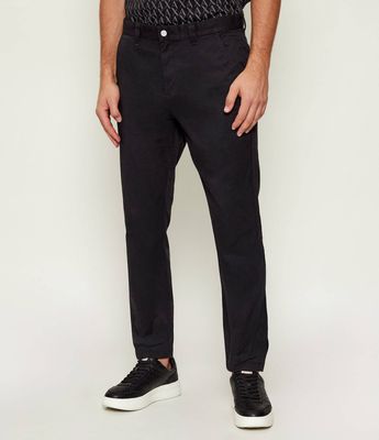 Tommy Jeans - Spodnie męskie jesienne ze sklepu: Gomez Fashion Store w kategorii: Spodnie męskie - zdjęcie 874714-BD9-10338_TM252M000067D44