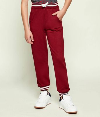 Spodnie chłopięce na jesień Guess ze sklepu: Gomez Fashion Store w kategorii: Spodnie chłopięce