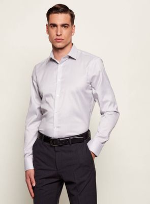 Koszula męska z klasycznym kołnierzykiem Calvin Klein ze sklepu: Gomez Fashion Store w kategorii: Koszule męskie - zdjęcie 874714-BD9-10338_CK261M000005F01