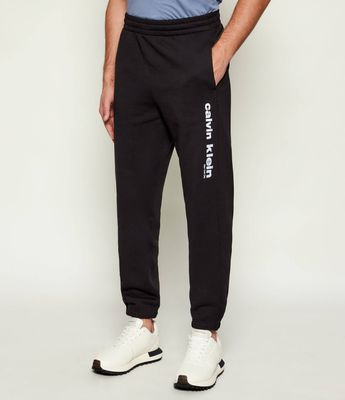 Spodnie męskie wiosenne Calvin Klein ze sklepu: Gomez Fashion Store w kategorii: Spodnie męskie - zdjęcie 874714-BD9-10338_CK261M000033544