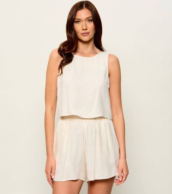 Bluzka damska wiosenna Guess ze sklepu: Gomez Fashion Store w kategorii: Bluzki damskie - zdjęcie 874714-BD9-10338_GW262W000066Q56