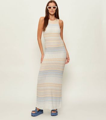 Sukienka dopasowana Guess ze sklepu: Gomez Fashion Store w kategorii: Sukienki - zdjęcie 874714-BD9-10338_GJ262W000133R86