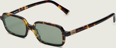Okulary przeciwsłoneczne damskie MIU MIU ze sklepu: Gomez Fashion Store w kategorii: Okulary przeciwsłoneczne damskie - zdjęcie 874714-BD9-10338_IU261W000002075