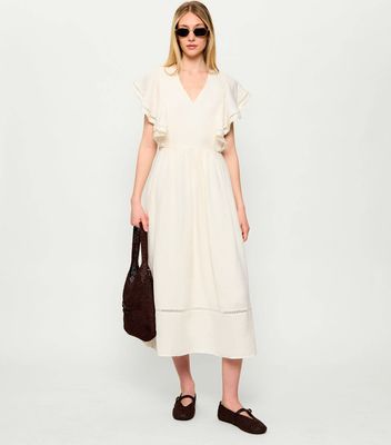 Sukienka trapezowa Tommy Hilfiger ze sklepu: Gomez Fashion Store w kategorii: Sukienki - zdjęcie 874714-BD9-10338_TH262W000219Z21