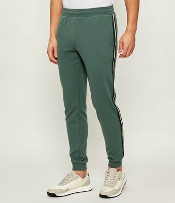 Spodnie męskie EA7 ze sklepu: Gomez Fashion Store w kategorii: Spodnie męskie - zdjęcie 874714-BD9-10338_E7262M000156F75