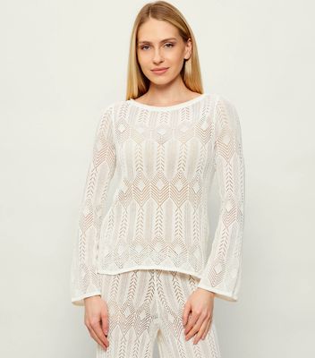 Sweter damski casual na wiosnę Liu Jo ze sklepu: Gomez Fashion Store w kategorii: Swetry damskie - zdjęcie 874714-BD9-10338_LJ262W000140701