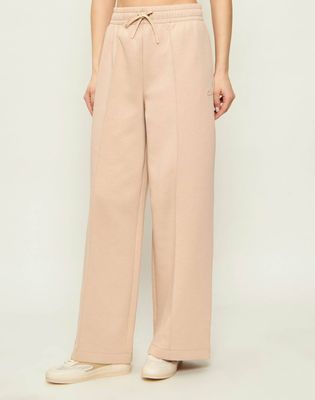 Spodnie damskie retro Lacoste ze sklepu: Gomez Fashion Store w kategorii: Spodnie damskie - zdjęcie 874714-BD9-10338_LA262W000070C32
