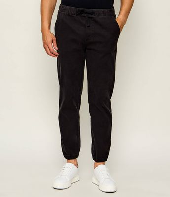 Spodnie męskie jesienne Tommy Jeans ze sklepu: Gomez Fashion Store w kategorii: Spodnie męskie - zdjęcie 874714-BD9-10338_TM264M000045D44