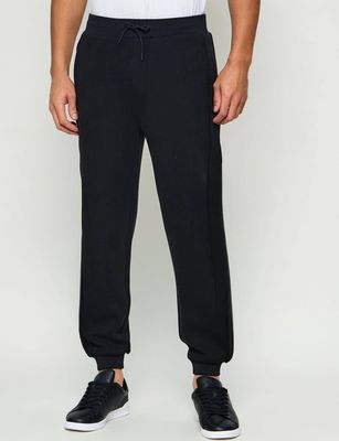 Spodnie męskie w sportowym stylu GUESS ACTIVE ze sklepu: Gomez Fashion Store w kategorii: Spodnie męskie - zdjęcie 874714-BD9-10338_GV265M000007046